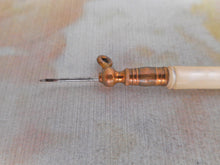Load image into Gallery viewer, A pearl handled crochet / tambour hook. c1860
