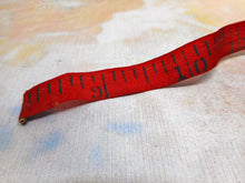 Load image into Gallery viewer, A mother of pearl 'bandstand' tape measure. c1850
