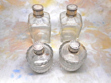 Load image into Gallery viewer, A set of four early French bottles. Palais Royal c1800.
