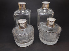 Load image into Gallery viewer, A set of four early French bottles. Palais Royal c1800.

