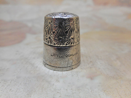 Antique Little Dorcas thimble.