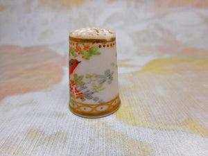 A very pretty 19thc hand painted porcelain thimble. c 1860