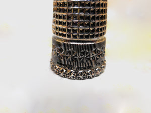 A very pretty silver thimble. Chester 1896 HW Ltd