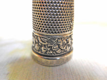 Load image into Gallery viewer, A silver thimble embossed with a band of flowers. c 1835 a/f
