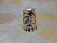 Load image into Gallery viewer, A silver thimble with pierced rim. Charles Horner.
