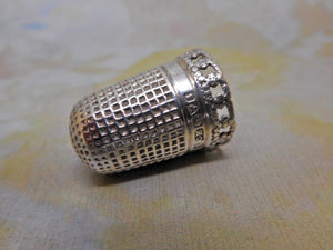 A silver thimble with pierced rim. Charles Horner. Late 19thc.