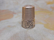 Load image into Gallery viewer, A French Art Nouveau silver thimble- Woman with flower. c1900
