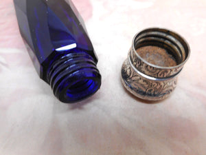 SOLD…………..An antique facet cut blue glass double ended scent bottle. c 1850..