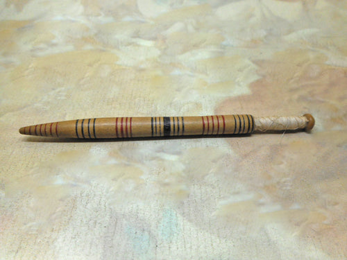 A  striped Honiton stick lace bobbin. 19thc