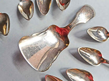 Load image into Gallery viewer, Ten Dutch silver demitasse spoons and matching caddy spoon. 19th century.
