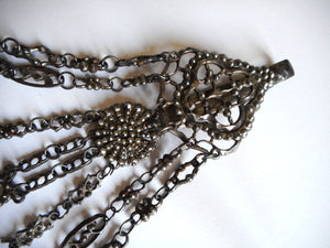 A fine cut steel chatelaine with steel studding. c 1860