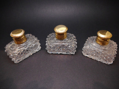Three antique cut glass scent bottles c1830
