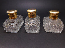 Load image into Gallery viewer, A trio of cut glass scent bottles. c 1830
