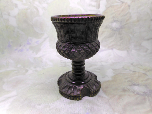 A carved coquilla nut egg cup. Mid 19th century.