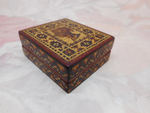 A Tunbridge Ware stamp box with used stamps. c 1860