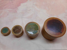 Load image into Gallery viewer, A set of four small Georgian wooden pots which fit inside each other. c1800
