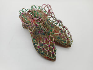 A pair of novelty bead worked shoes. 19th century.