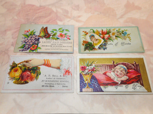 Four old American trade and visiting cards.