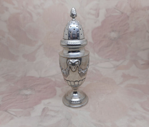 An antique French silver pepperette. Late 19th century.