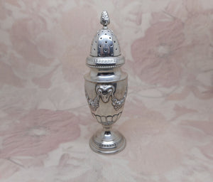 An antique French silver pepperette. Late 19th century.