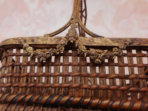 A small ( 12 x 8 cm ) ormolu mounted wicker work basket. French c 1860.