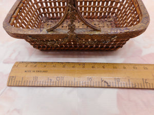 A small ( 12 x 8 cm ) ormolu mounted wicker work basket. French c 1860.