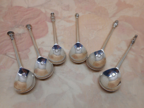 6 hall marked silver tea spoons. Seal topped. 1938.