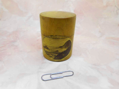 A Mauchline Ware cotton reel holder with a view of Ilfracombe.