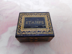 A Tunbridge Ware stamp box inlaid with miniature parquetry spelling 'Stamps'