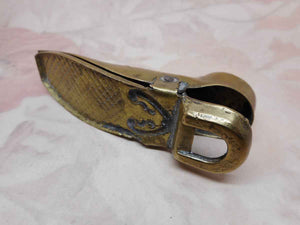 SOLD…….A shoe shaped brass paper / letter clip. Reg. Design 1872