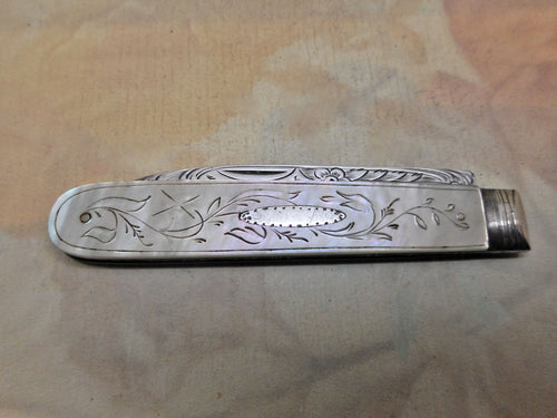 A Victorian folding fruit knife. Hall marked 1854.