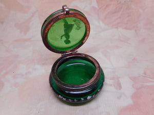 SOLD…….A green glass trinket box with 'Mary Gregory' decoration. c1900