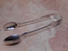 Load image into Gallery viewer, Newcastle hall marked silver sugar tongs. 1867 JW maker.
