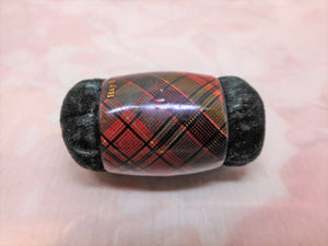 A Tartan Ware double ended emery cushion. c1860.  Hay & Leith