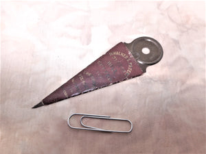 An unusual metal buttonhole cutter. 'Walker's Patent' wrapper. 19thc