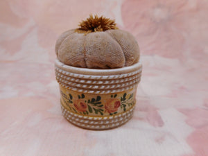 SOLD...............A Regency painted bone pincushion. Cheltenham. c 1830