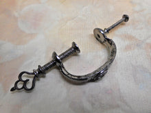 Load image into Gallery viewer, A fine cut steel netting clamp. c 1800
