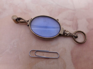 A lorgnette with blue tinted lenses. 19thc