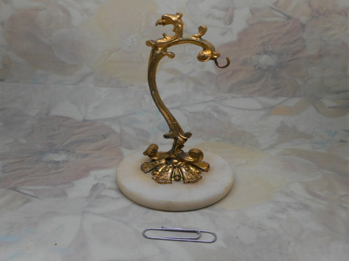 A fob watch stand on an alabaster base. French c1860