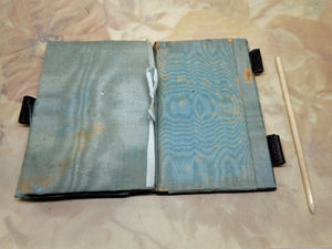 A lacquer note book with swan inlay. French. c 1850