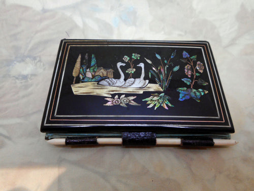 A lacquer note book with swan inlay. French. c 1850