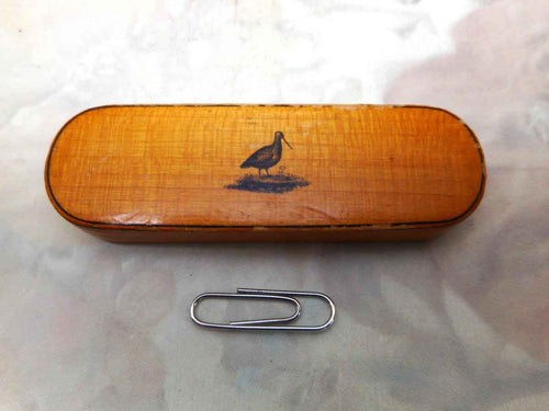 A Scottish Mauchline Ware toothpick box painted with a game bird