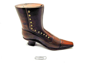 A large wooden table snuff box in the form of a boot c1870