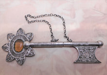 Load image into Gallery viewer, A Dutch silver filigree knitting needle protector in the shape of a key. c 1870
