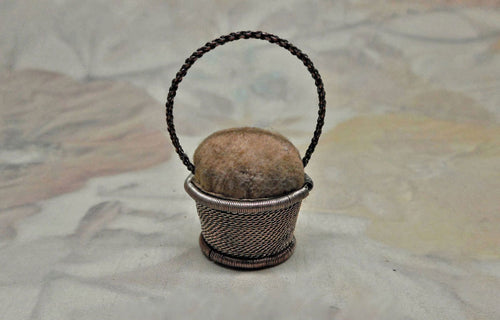 A small silver wire work emery basket. c1800