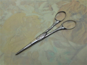 A pair of Georgian silver scissors and sheath. c 1800 a/f