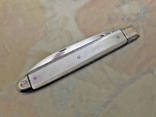 A capped antique mother of pearl folding fruit knife. c 1800