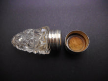 Load image into Gallery viewer, A small cut glass scent bottle with silver lid. HM. 1909.
