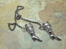 Load image into Gallery viewer, SOLD……A pair of silver knitting needle ends -lady&#39;s stockinged legs. Late 19thc
