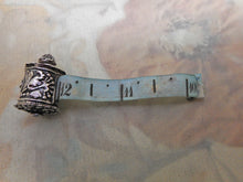 Load image into Gallery viewer, SOLD…….An embossed silver tape measure.  c1830
